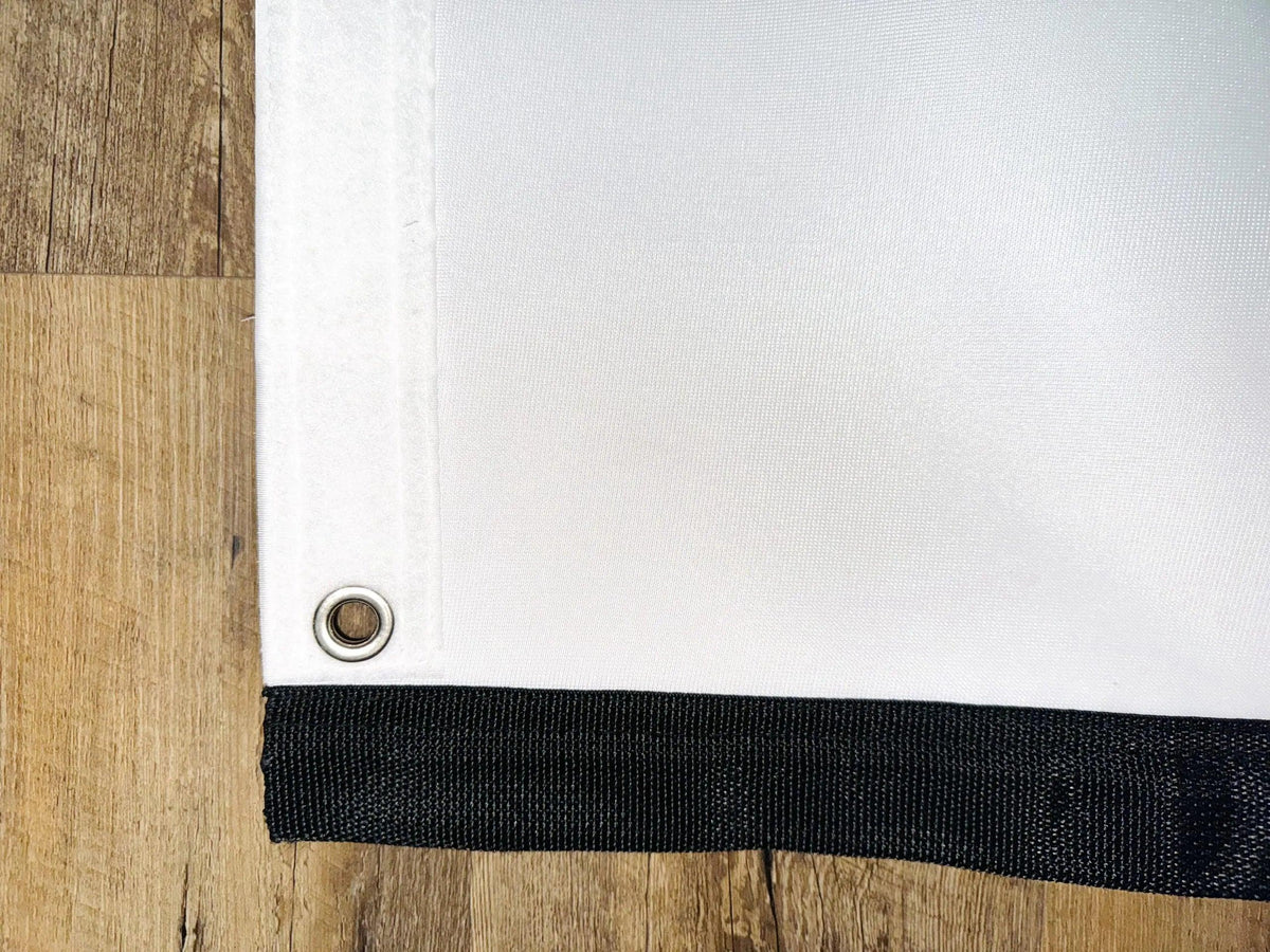 Premium retractable golf impact screen with a durable 3-layer polyester blend, designed to reduce noise, resist pot marks, and prevent burn-in from high-velocity impacts.