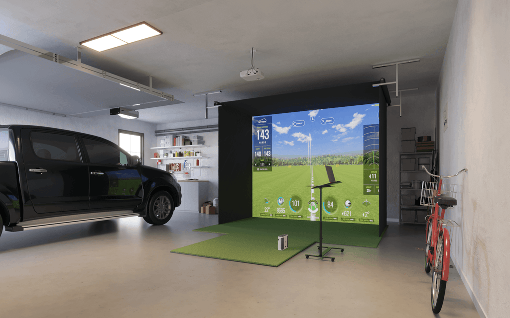 Retractable vanish 11 in garage with car next to golf sim to show space versatility 