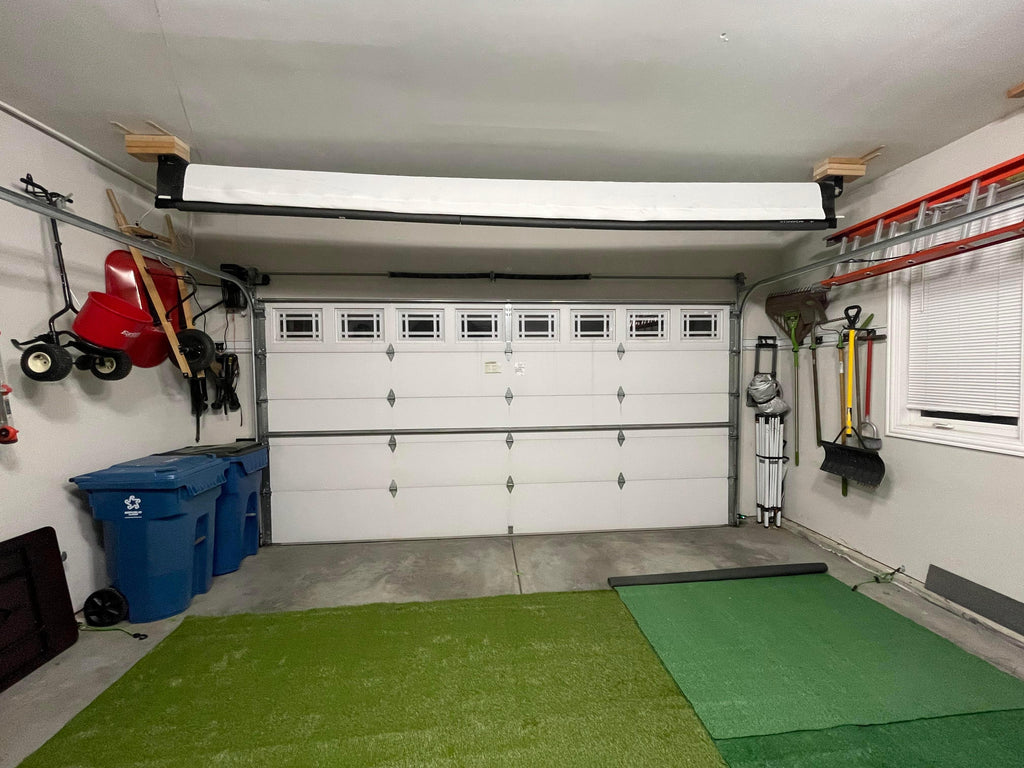 DIY SportScreen retractable impact screen in a garage