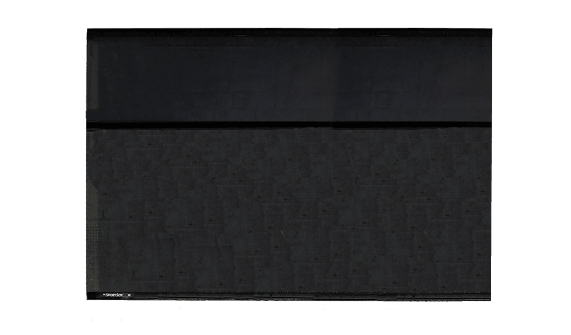 A 12ft wide by 10ft tall SportScreen, set up for indoor sports practice, showcasing its large, durable screen designed for hockey training.