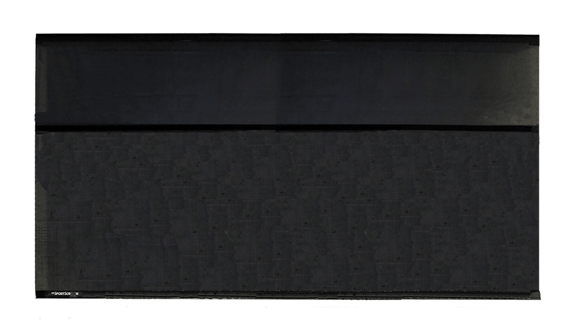 A 16ft wide by 10ft tall SportScreen, set up for indoor sports practice, showcasing its large, durable screen designed for hockey training.