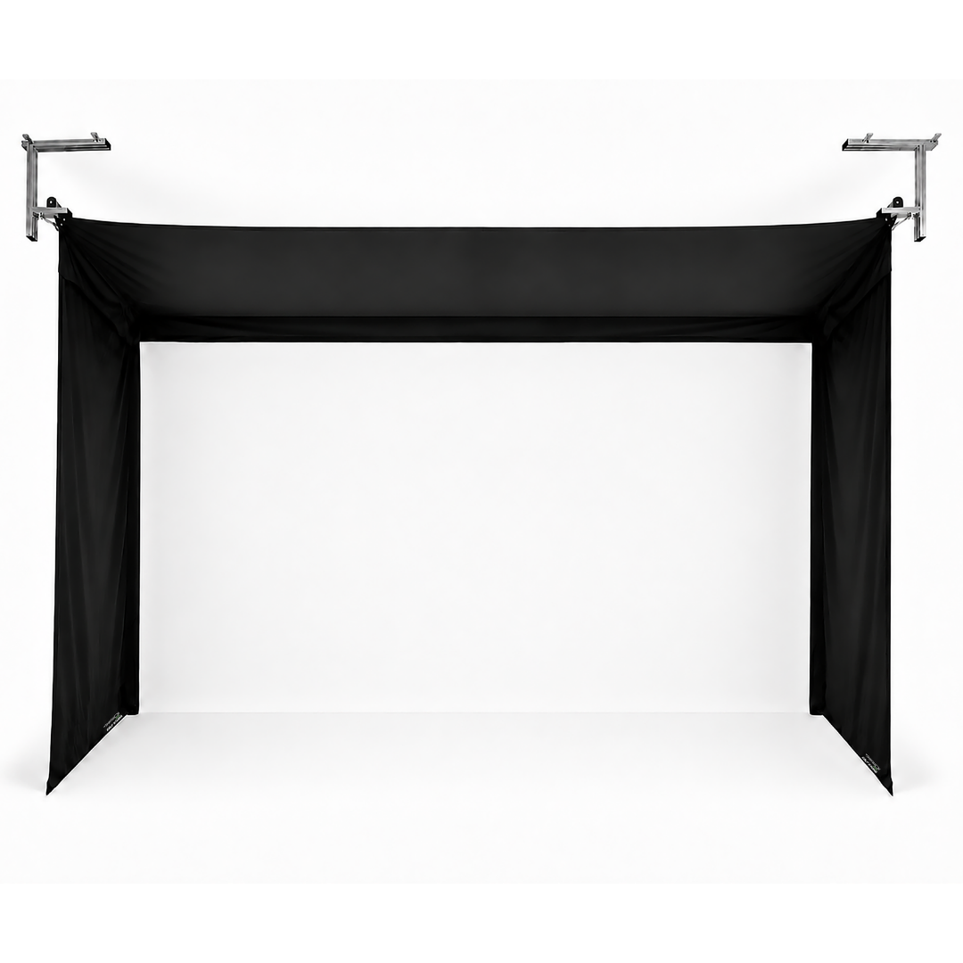 Vanish 16H retractable golf enclosure with white impact screen fully deployed