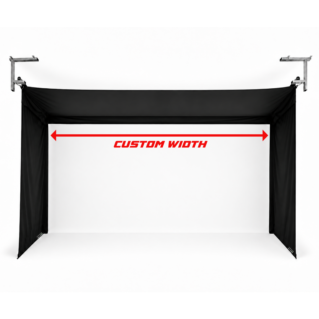 Custom-width Vanish Series retractable golf enclosure with white impact screen