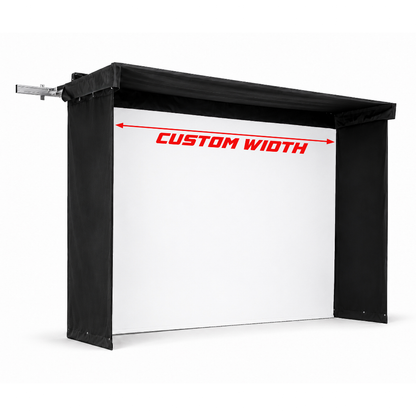 Side view of a custom-width Vanish Lite golf enclosure with white impact screen and width overlay