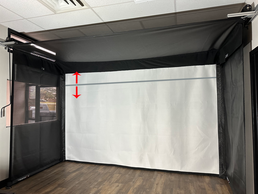 White golf impact screen in an enclosure with a red arrow showing the velcro height adjustment