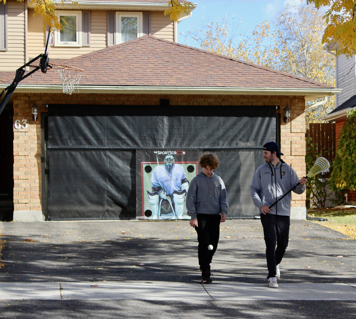 Kids playing lacrosse on 16ft SportScreen