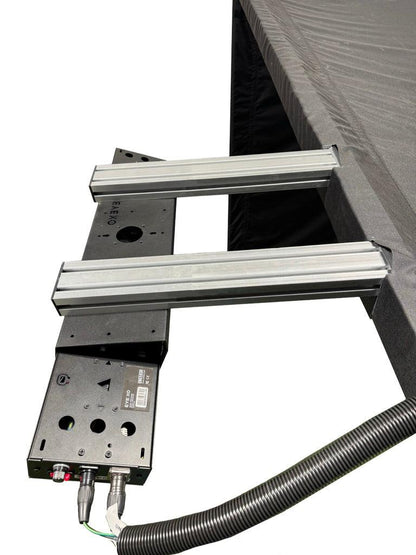 Parlour Series Launch Monitor Bracket mounted to a golf enclosure frame, shown on a plain background