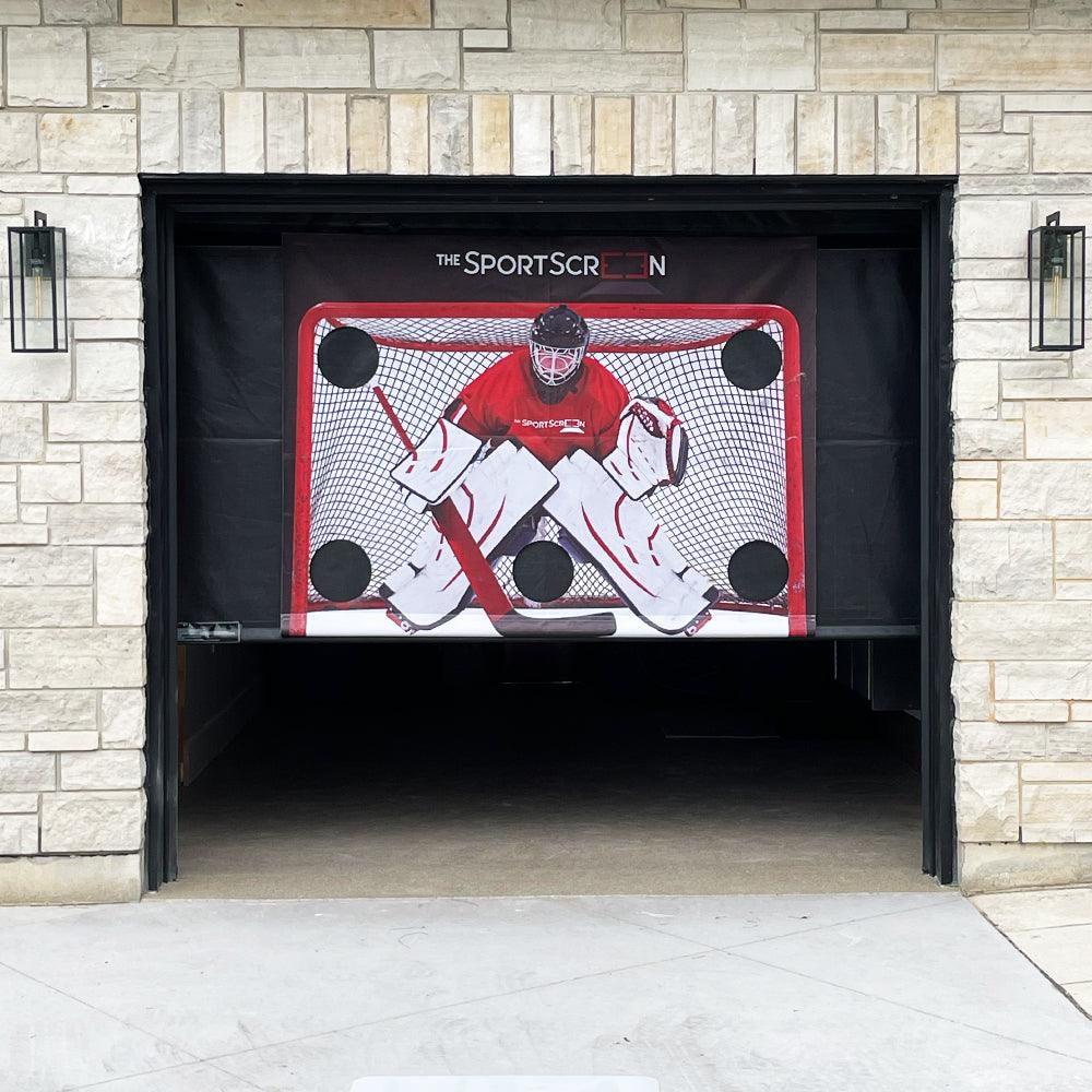 SportScreen mounted on versatile mounting brackets and retracting inside garage.