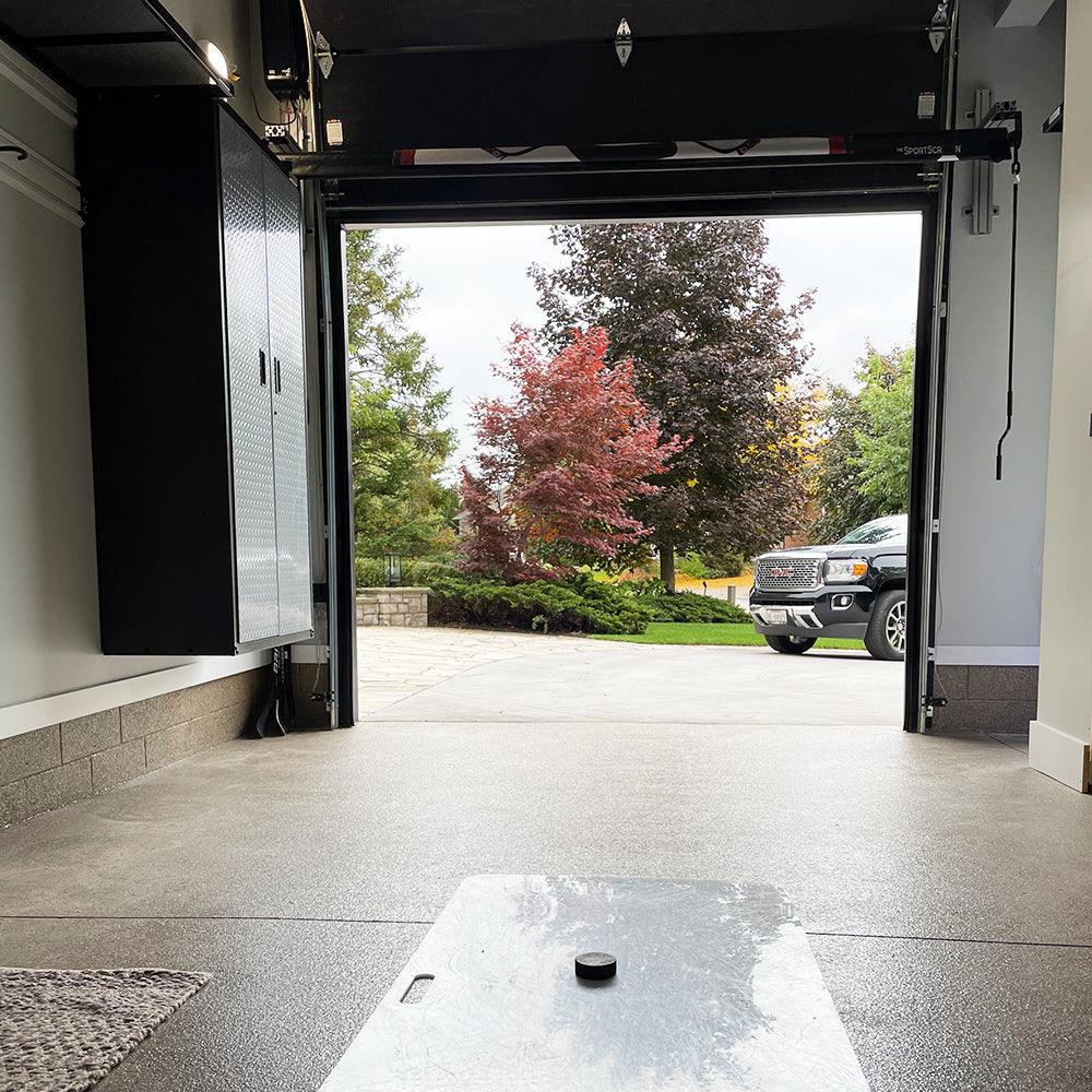 The SportScreen mounted around garage rails with Versatile Mounting Brackets.