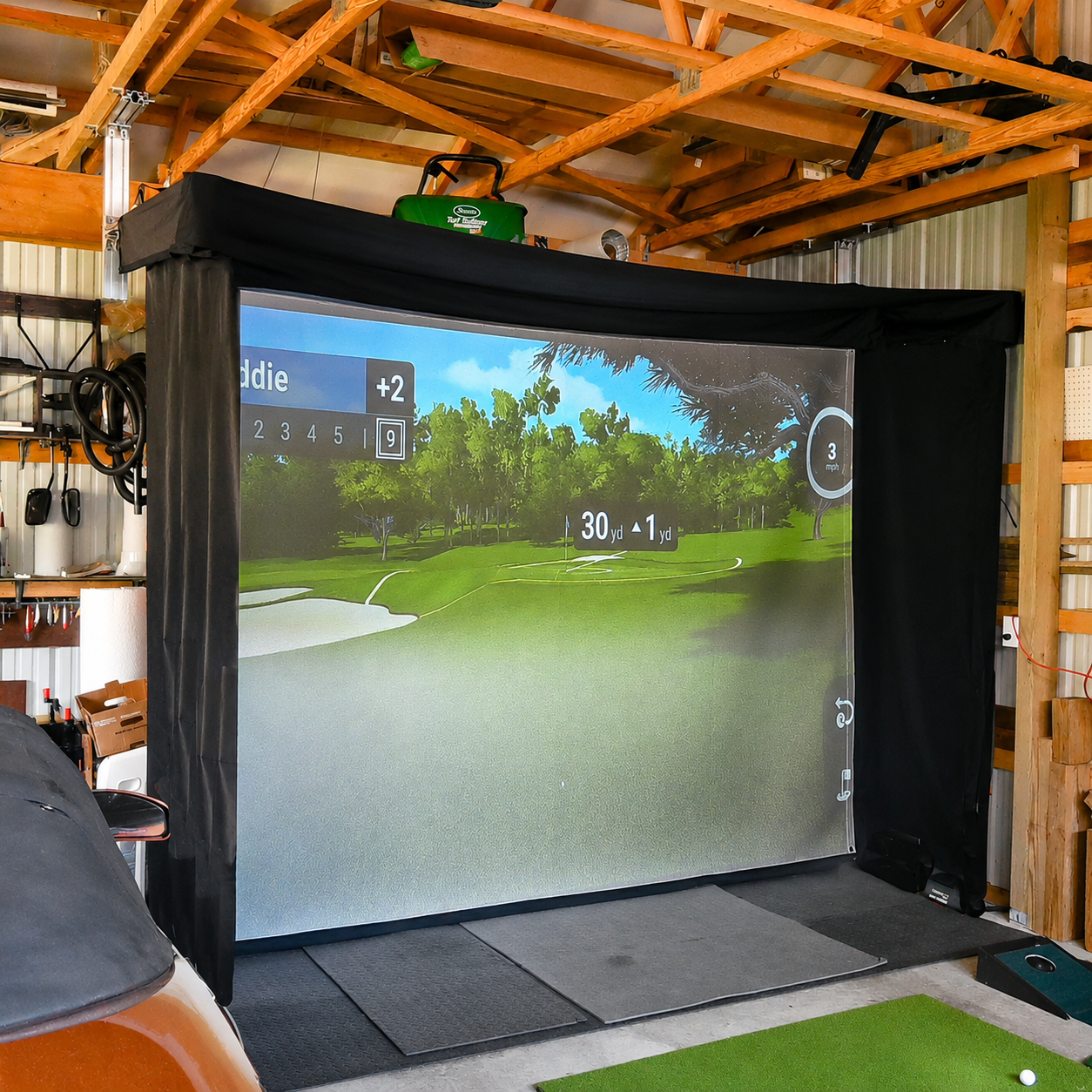 Vanish Lite 11 golf impact screen ceiling mounted in a garage