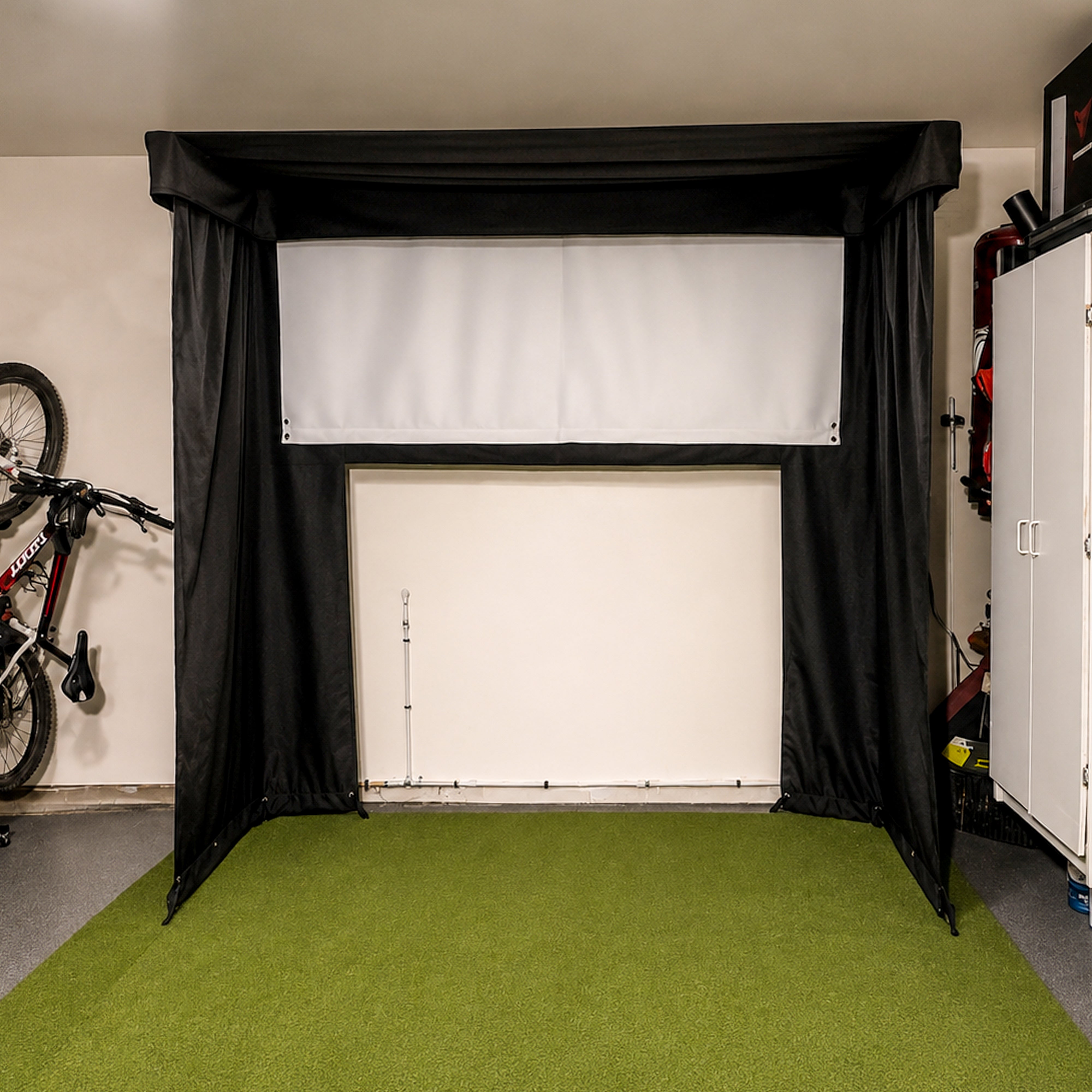 Vanish Lite 9 golf impact screen half rolled up and wall mounted